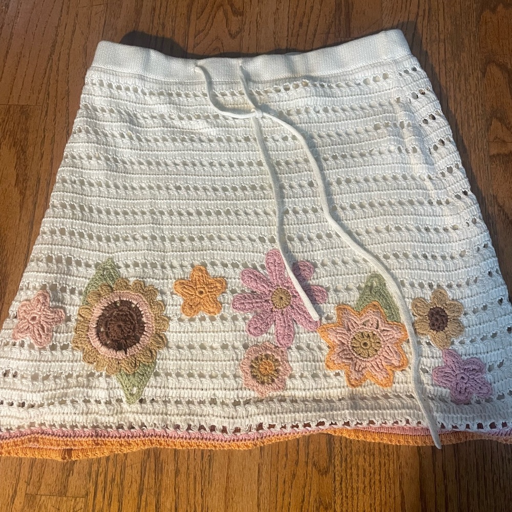 Mini crochet skirt.